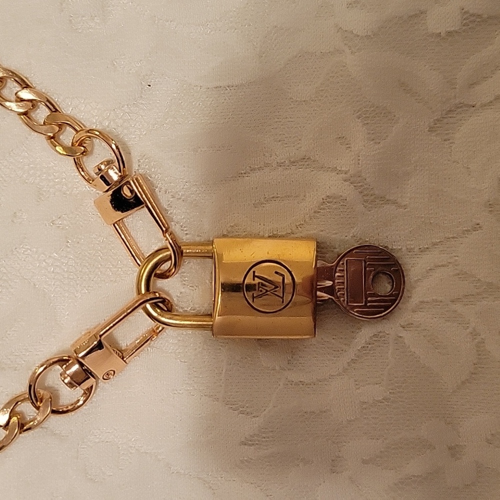 #5 Vintage Louis Vuitton lock and key #204